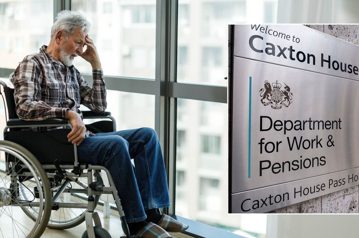 Man in wheelchair and DWP sign