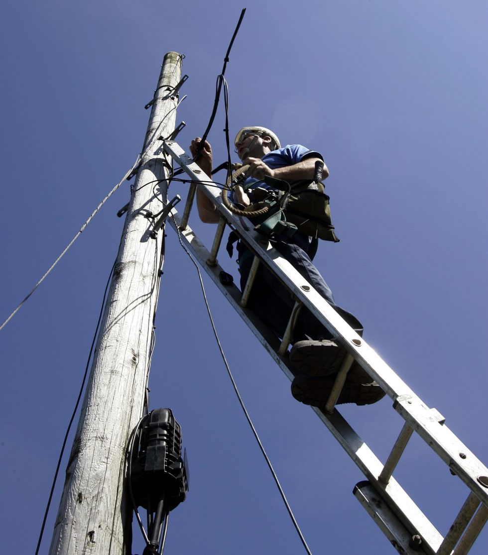 Man installing a pole