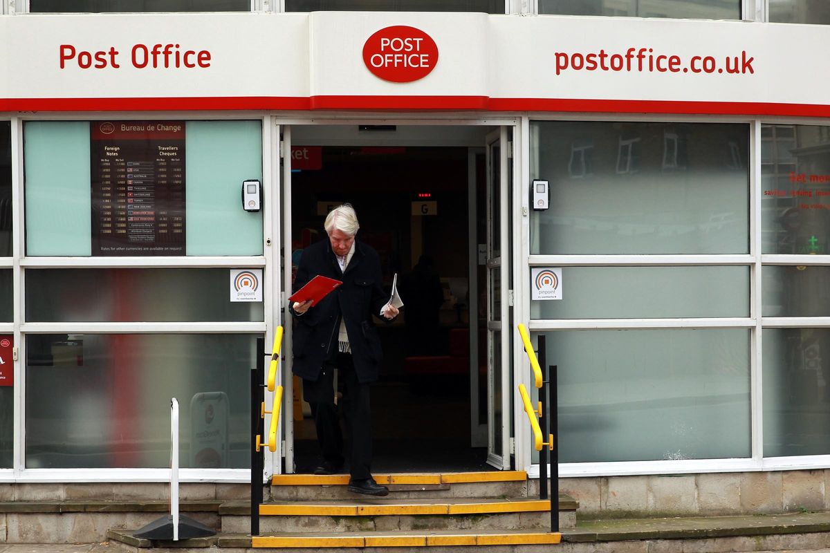 Man leaving a post office