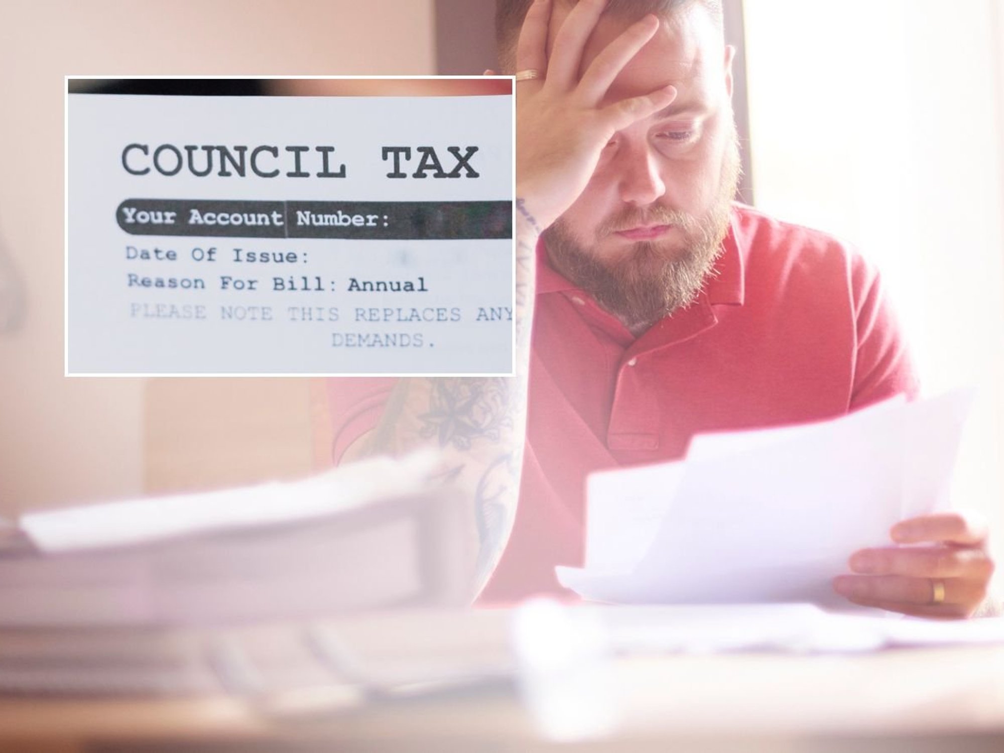 Man looking at bill and council tax letter