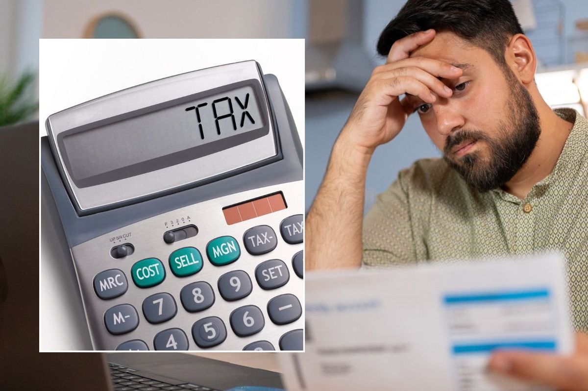 Man looking at bill and tax written on calculator