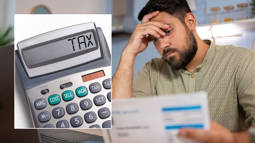 Man looking at bill and tax written on calculator