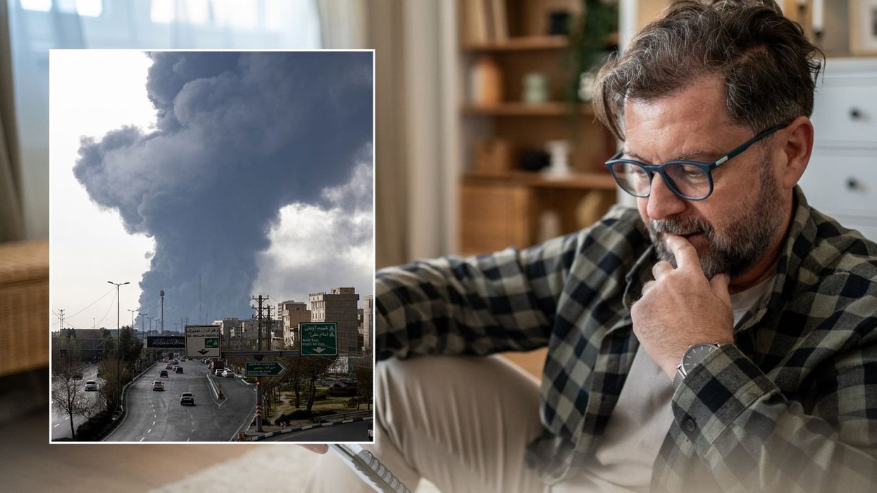 Man looking at bill and US strike on Tehran, Iran