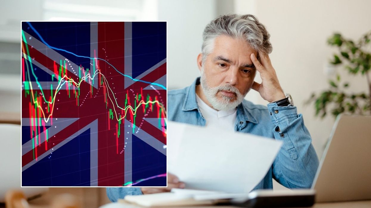 Man looking at form and interest rate graph