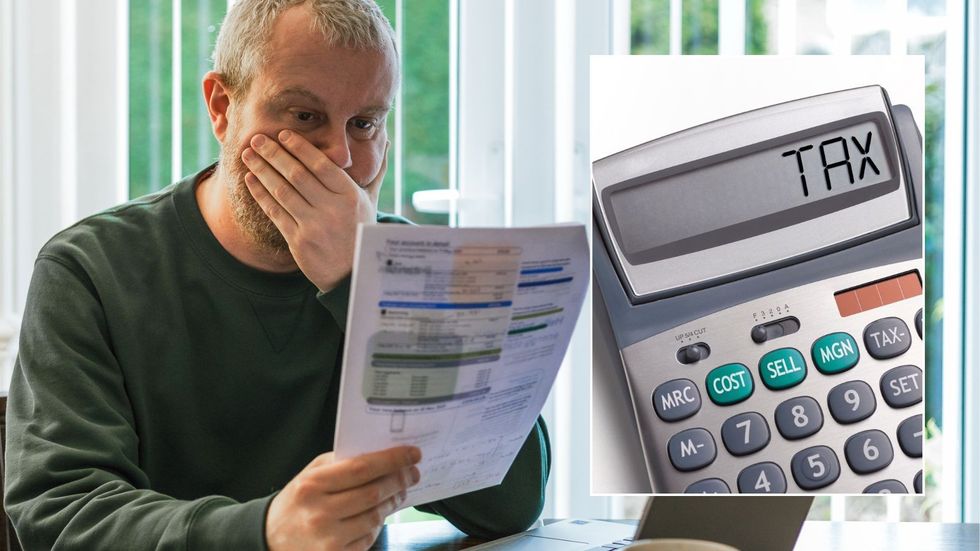 Man looking at form and tax calculator