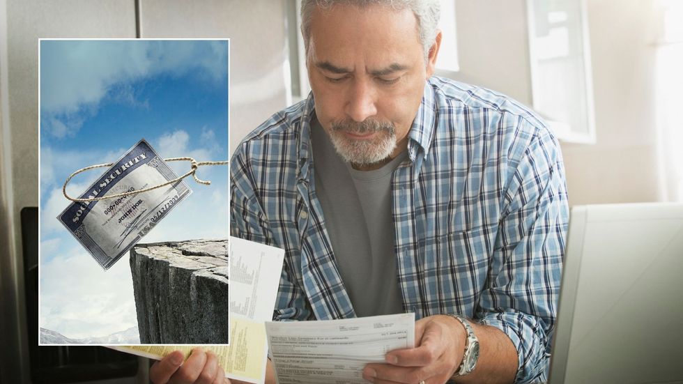Man looking at forms and Social Security check