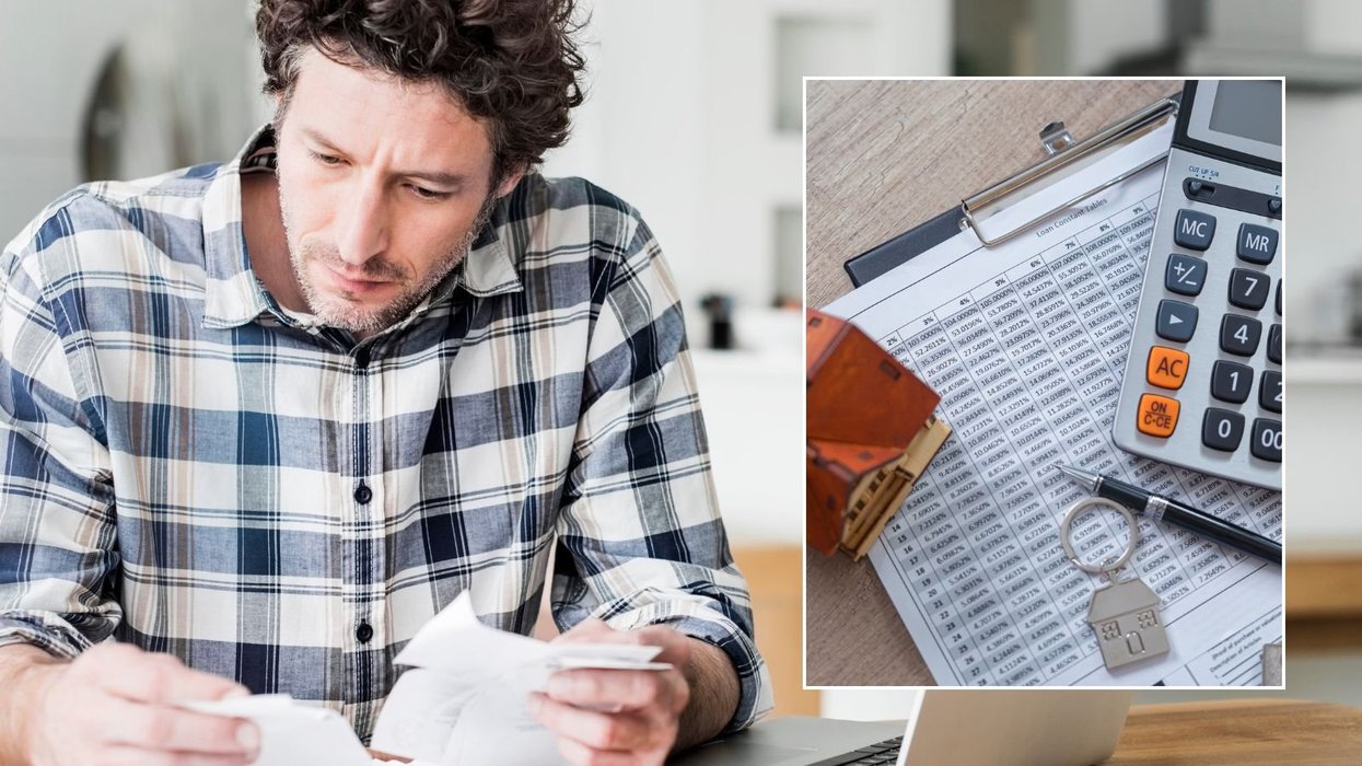 Man looking at forms and tax power