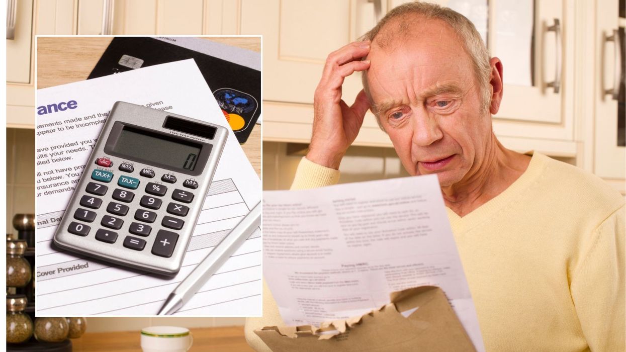 Man looking at letter and calculator