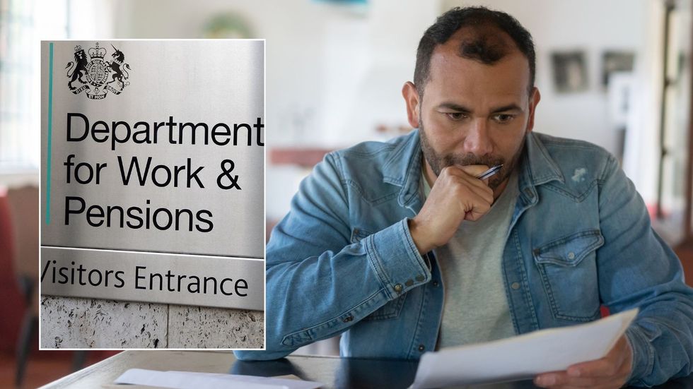 Man looking at letter and DWP sign 