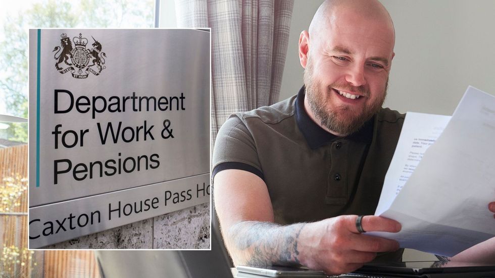 Man looking at letter and DWP sign