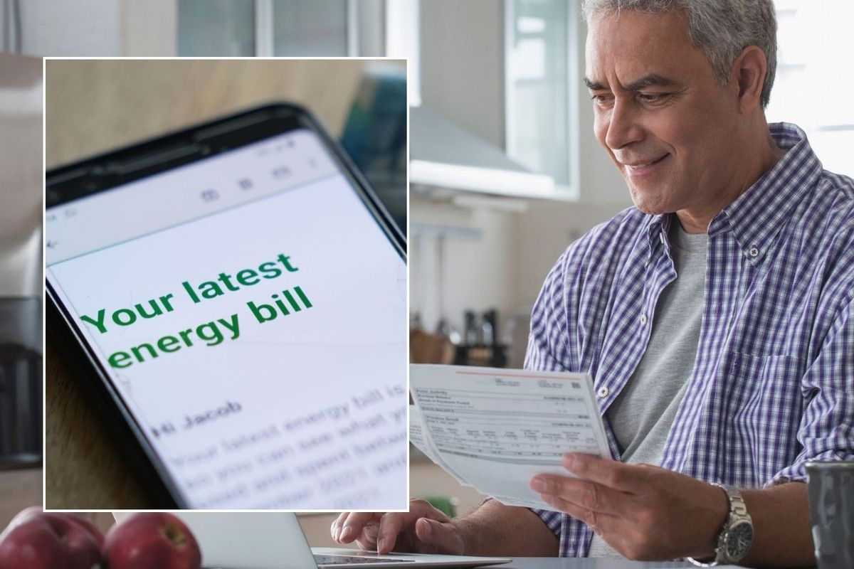 Man looking at letter and energy bill