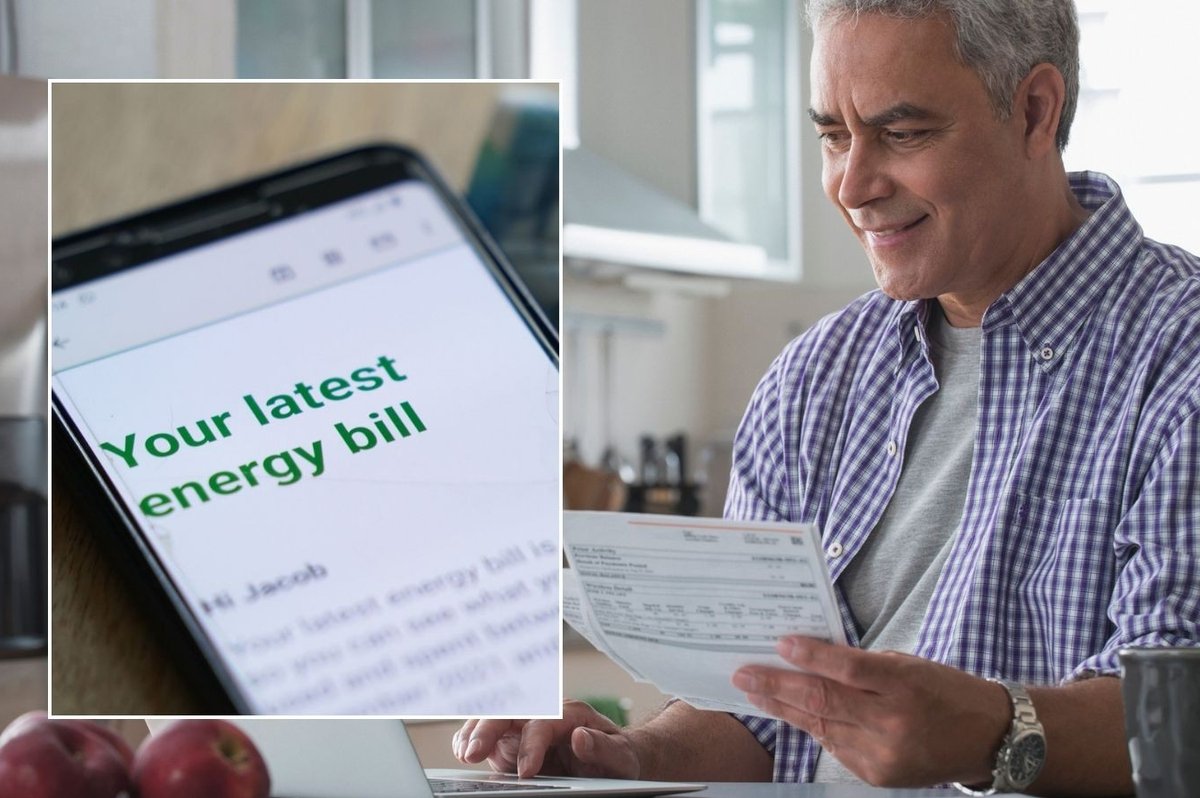 Man looking at letter and energy bill