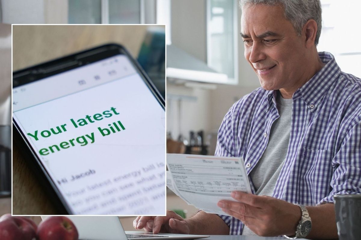 Man looking at letter and energy bill