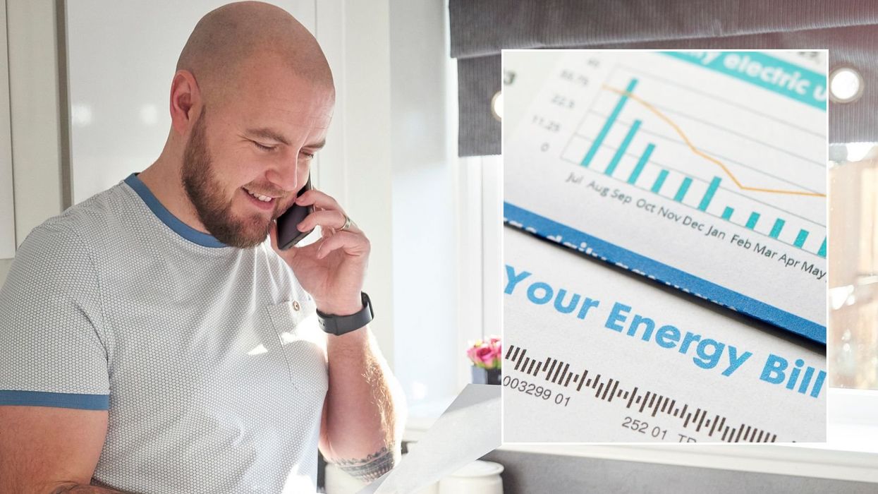 Man looking at letter and energy bill