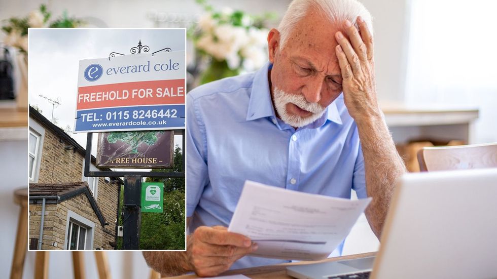Man looking at letter and freehold sign