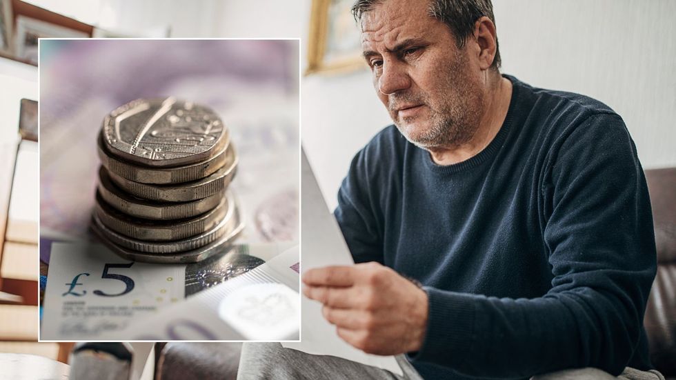 Man looking at letter and money