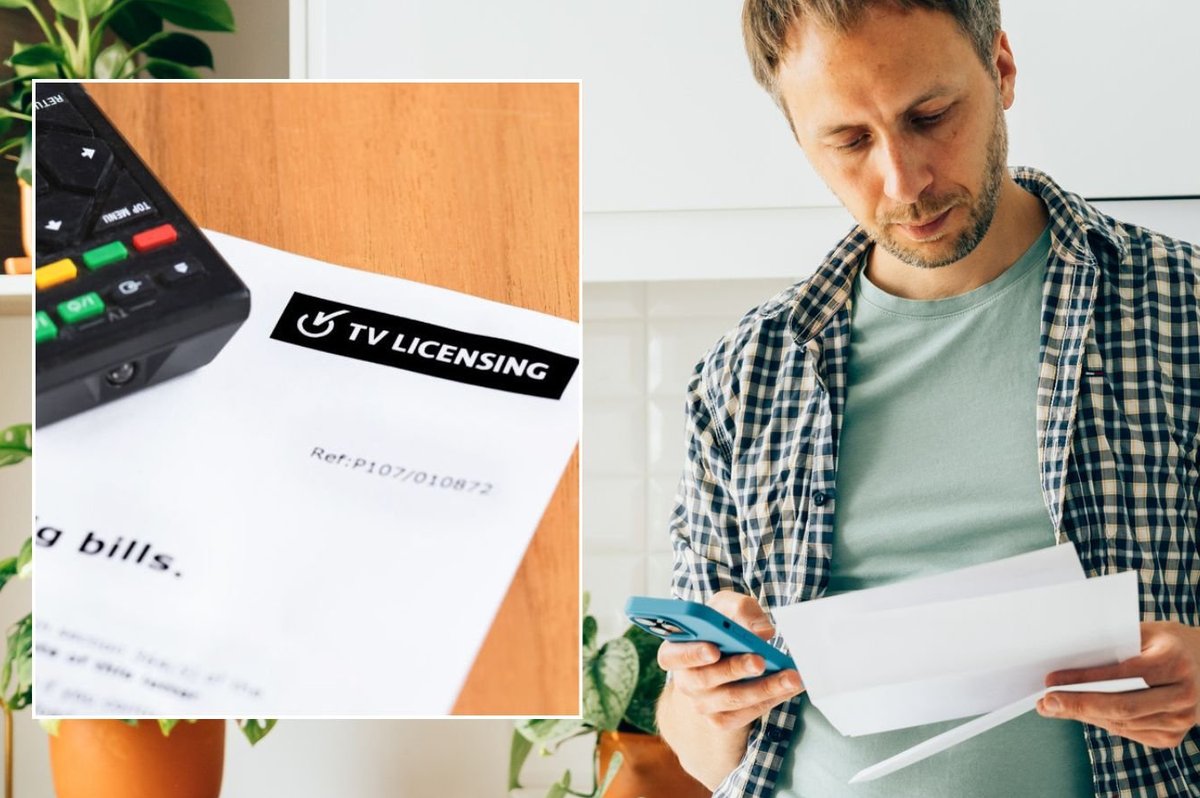 Man looking at letter and TV licensing