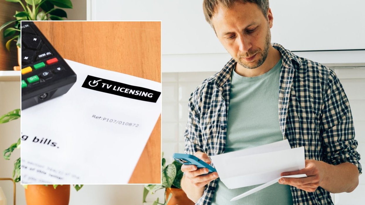 Man looking at letter and TV licensing