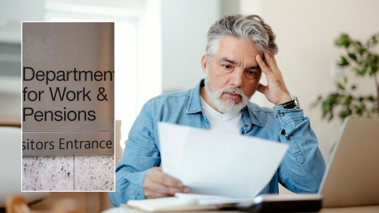 Man looking at paper and DWP