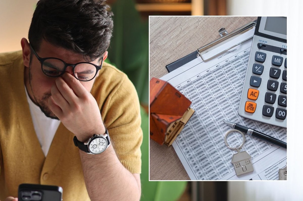 Man looking at phone and property tax form