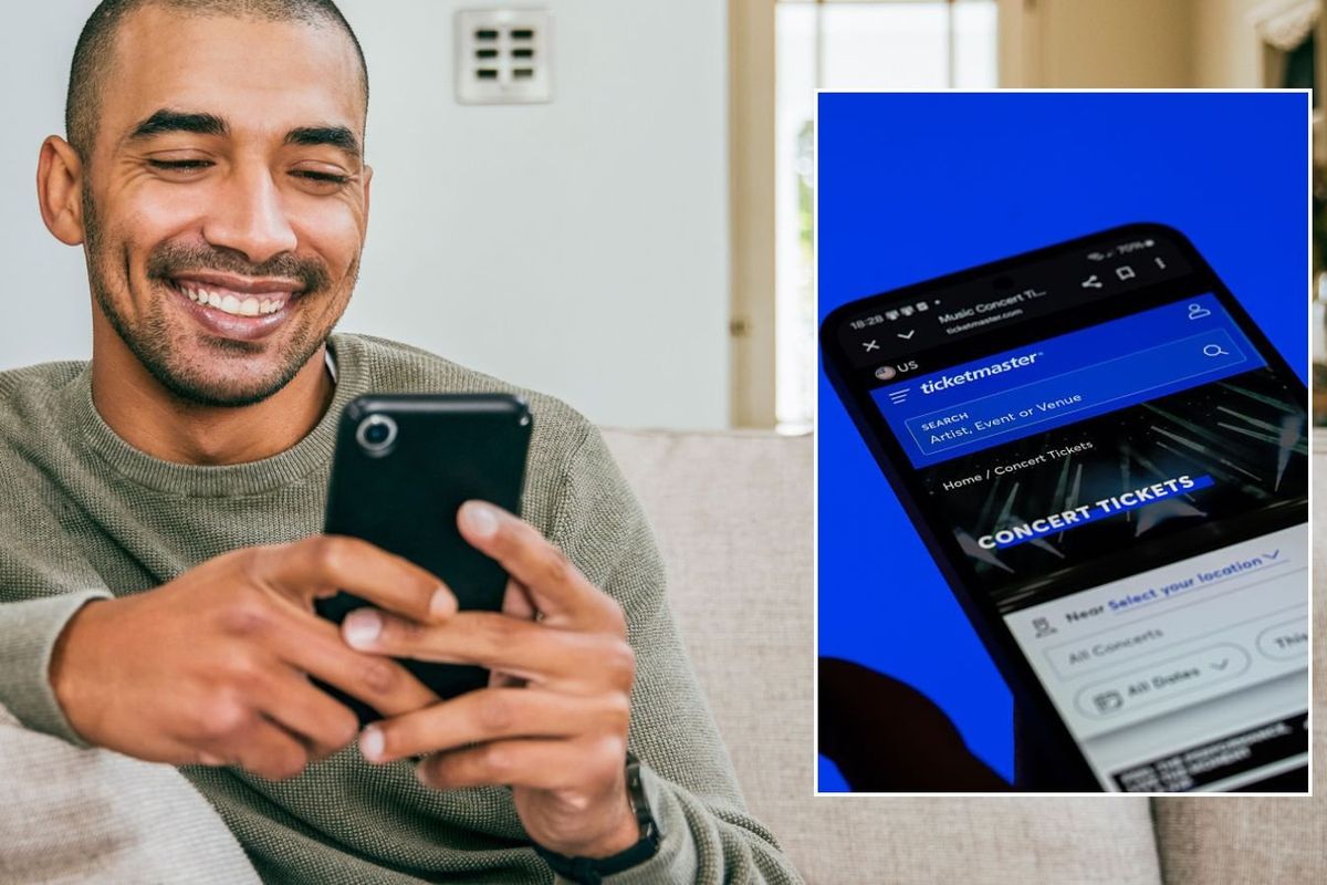 Man looking at phone and Ticketmaster app
