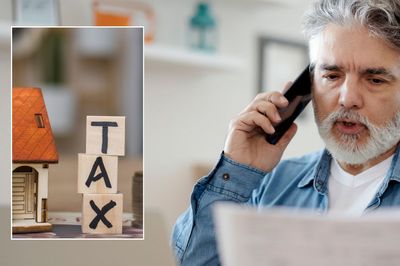 Man looking at tax bill