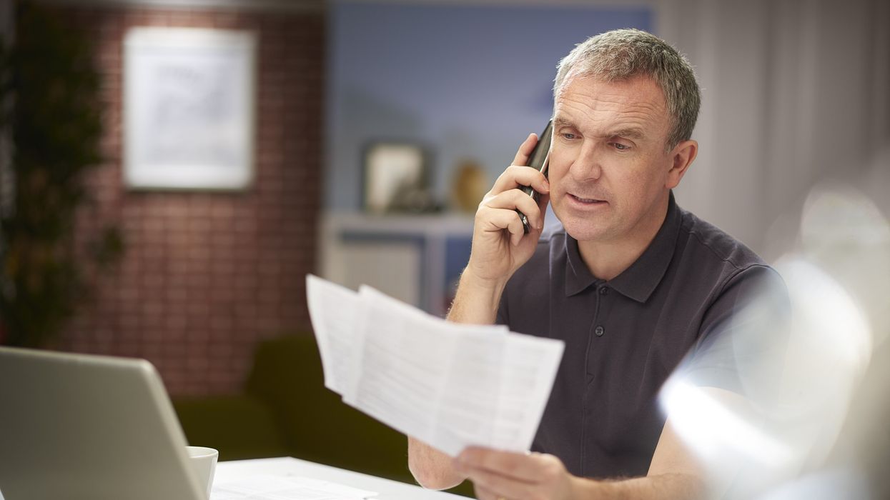 Man looking at taxes