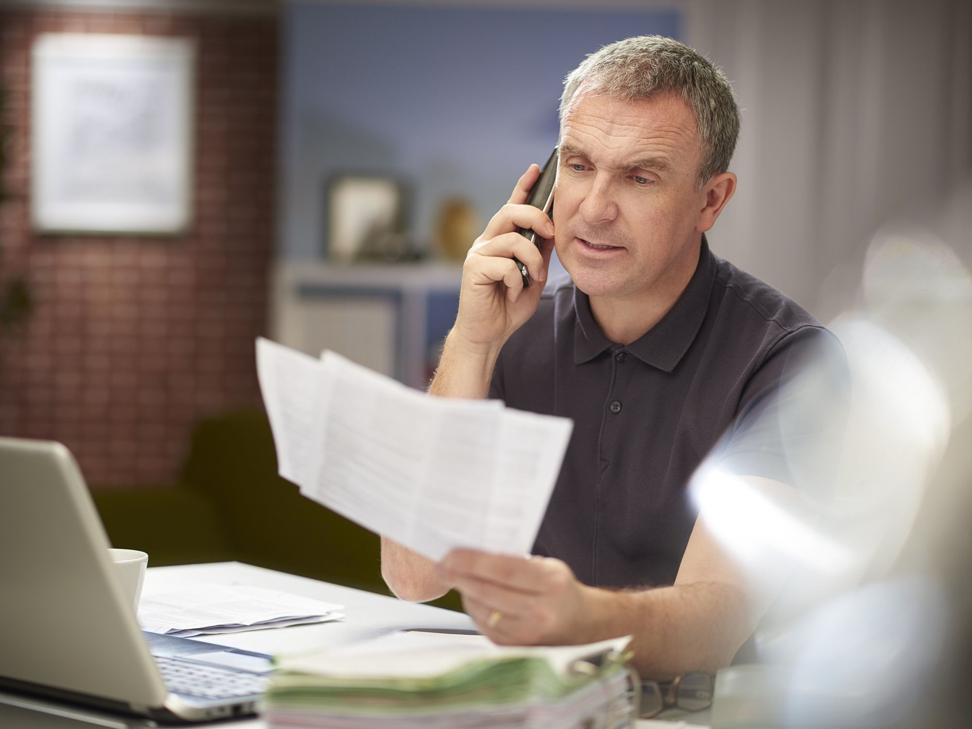 Man looking at taxes