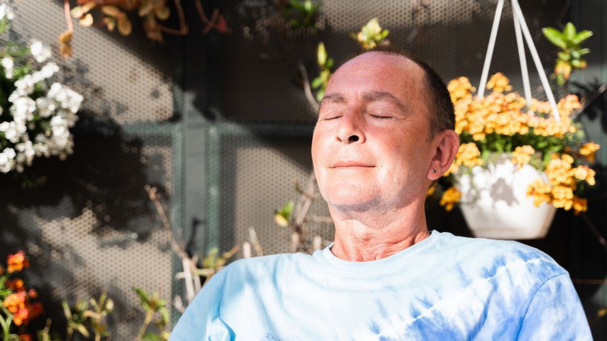 Man looking calm with his eyes closed