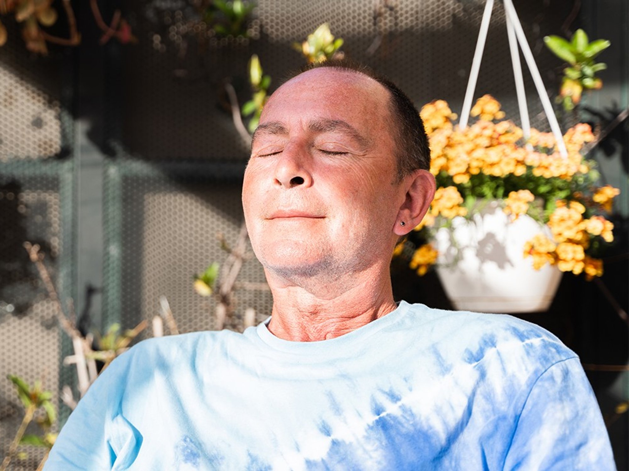 Man looking calm with his eyes closed