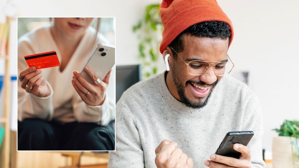 Man looking happy at phone