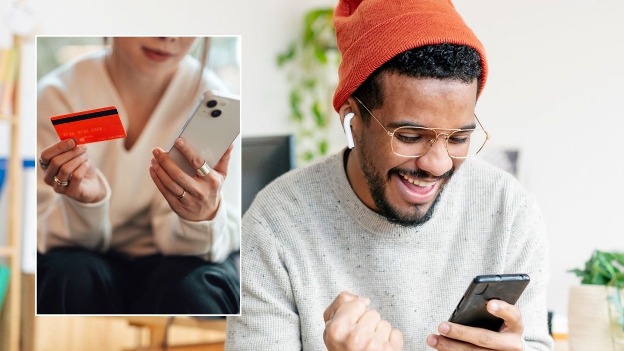 Man looking happy at phone