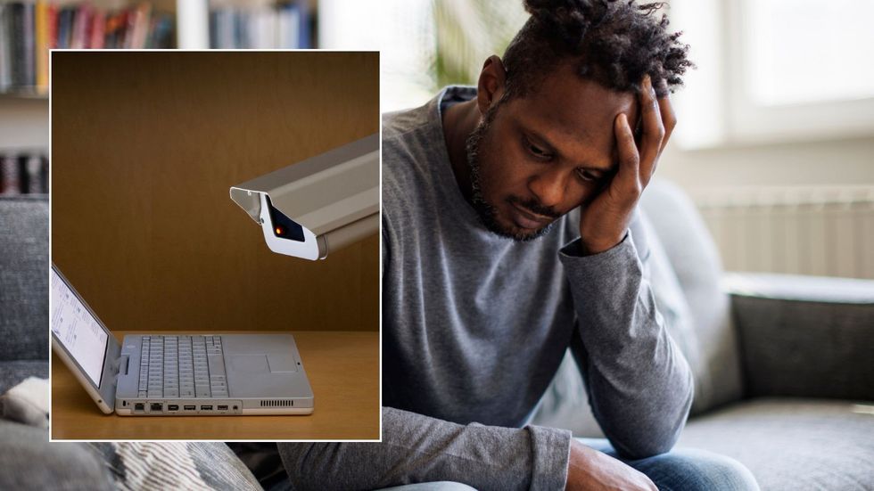 Man looking upset and camera looking at laptop