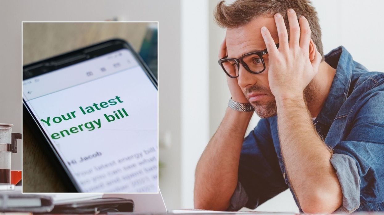 Man looking worried and energy bill