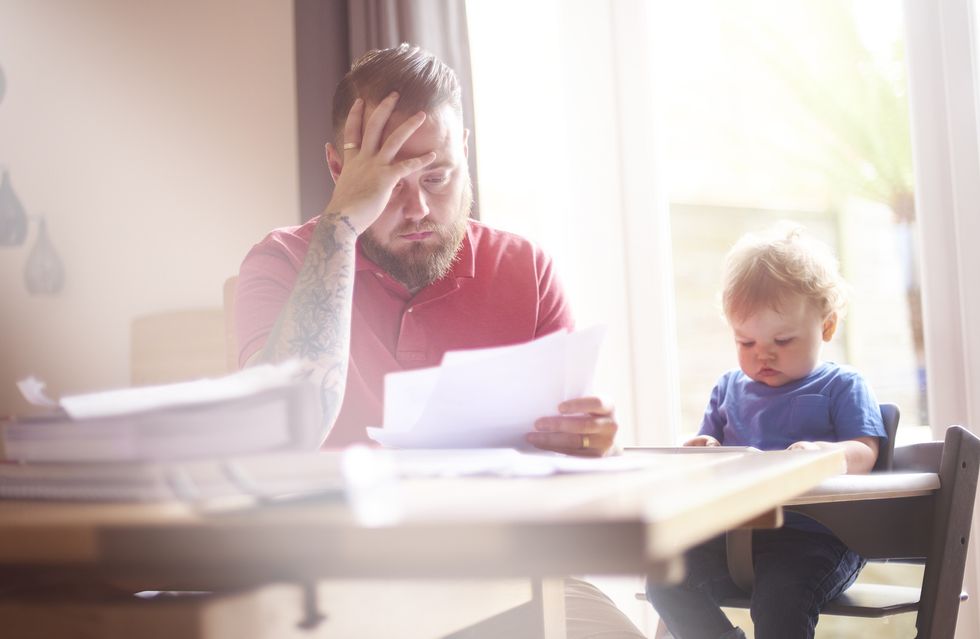 Man looking worried at form