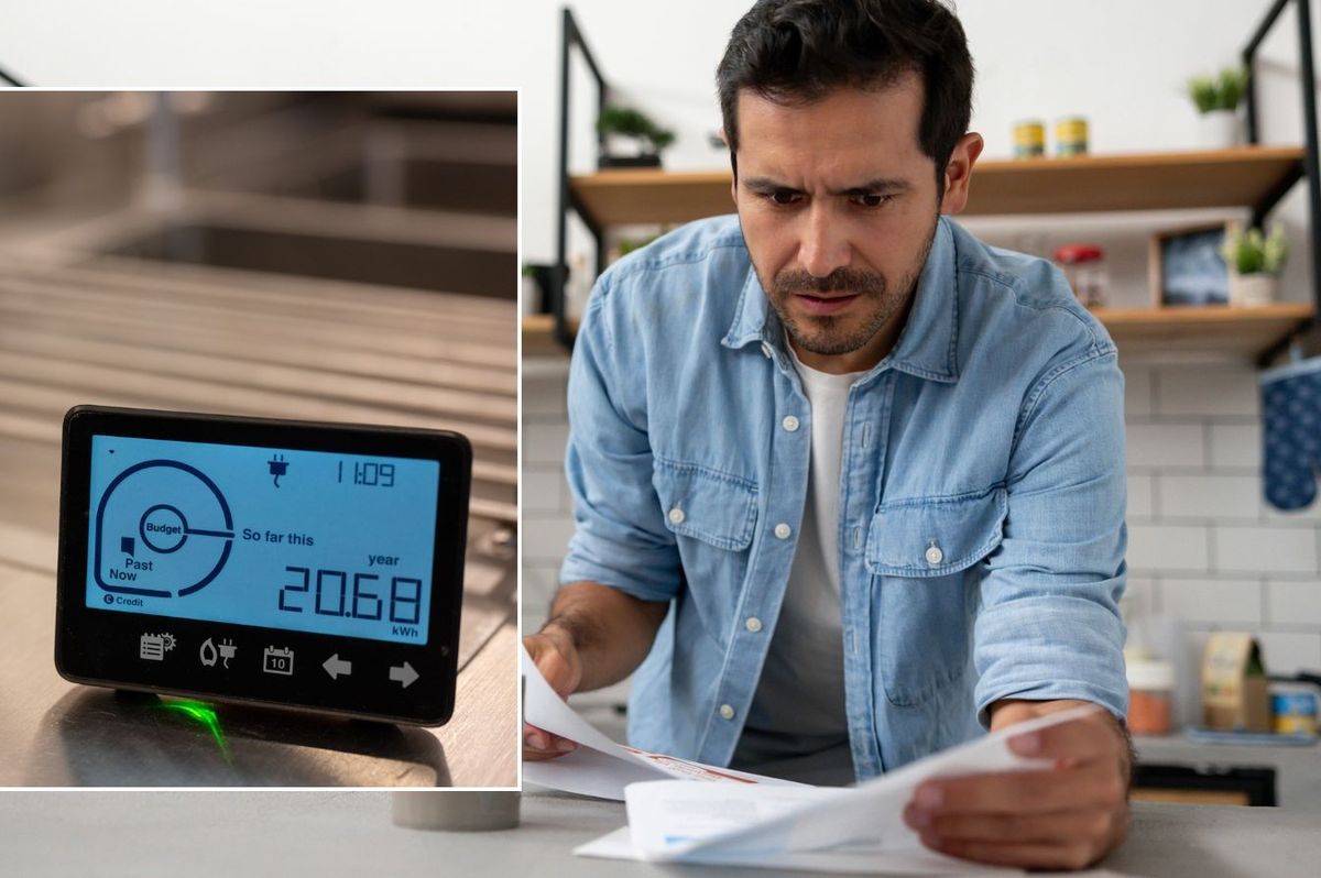 Man looking worried at letter and smart meter