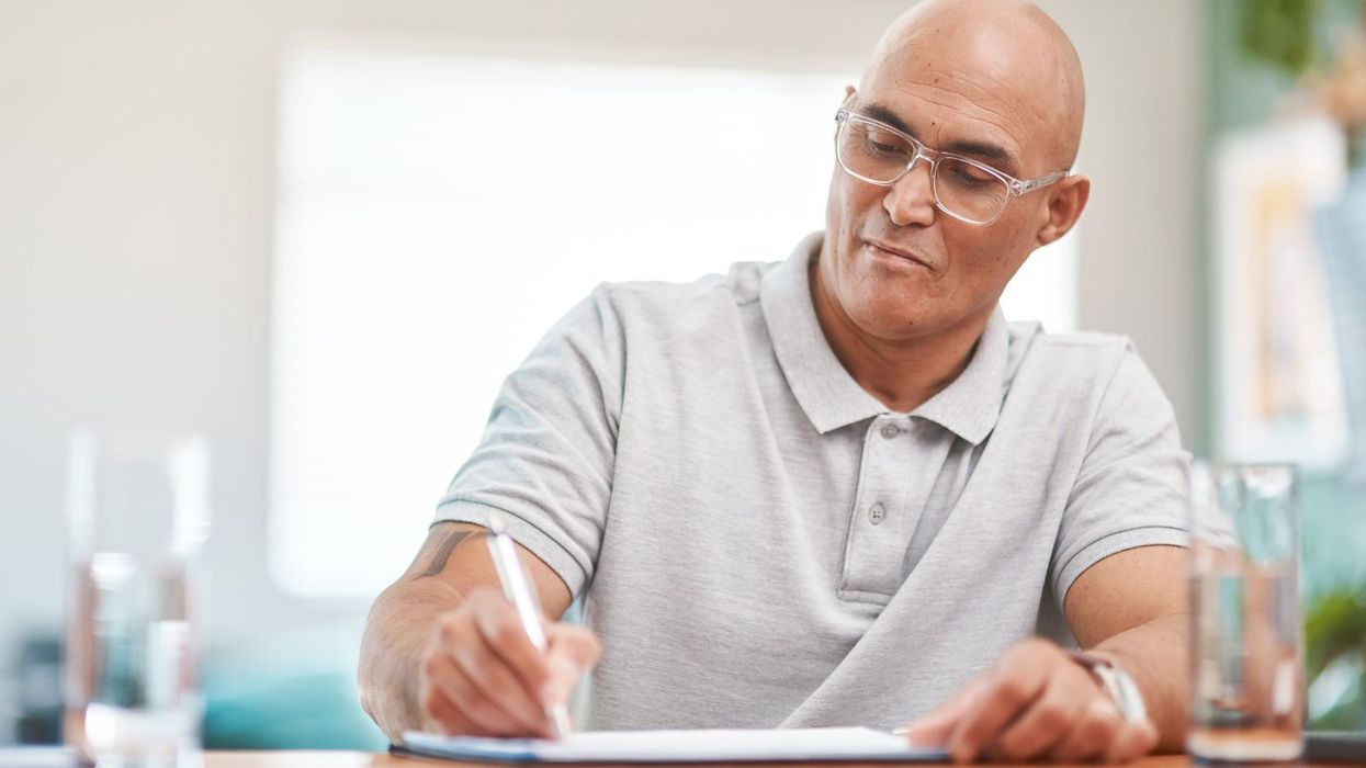 Man looks at document