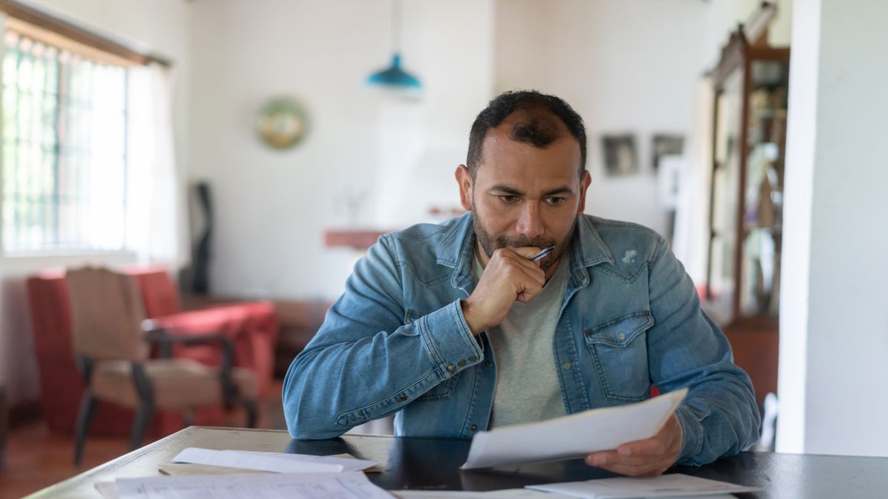 Man looks at documents