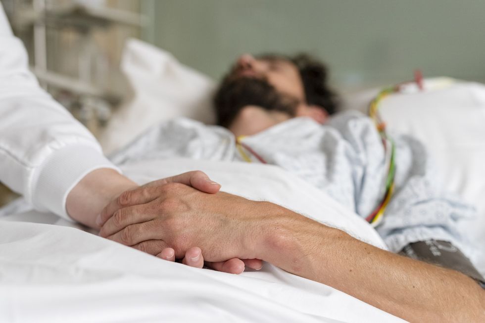 Man on hospital bed