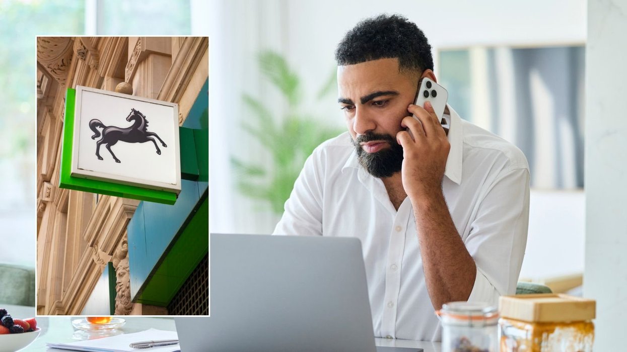 Man on phone and Lloyds Bank sign