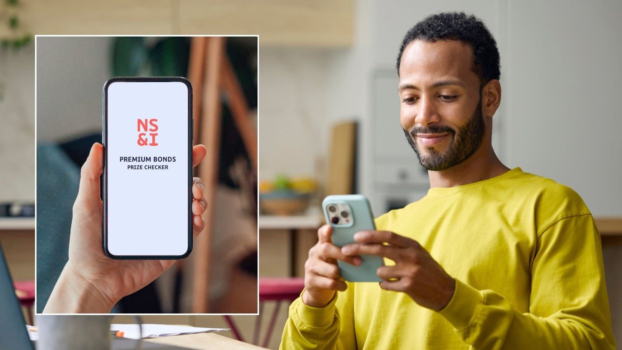 Man on phone and Premium Bonds checker