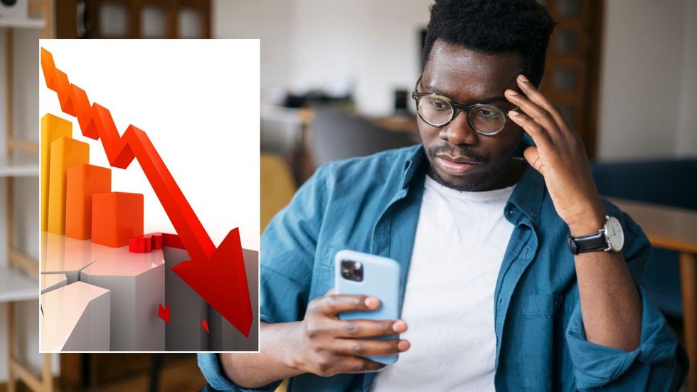 Man on phone looking worried and interest rate graph