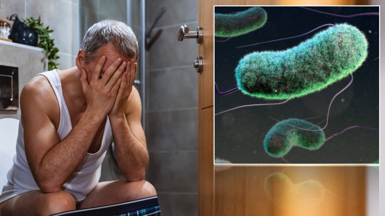 Man on toilet next to E.coli particle