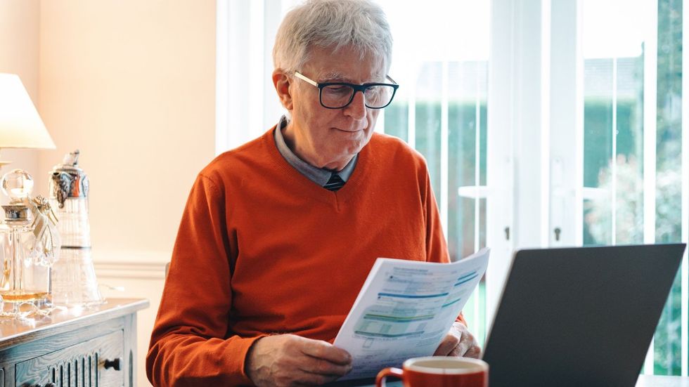 Man reading letters