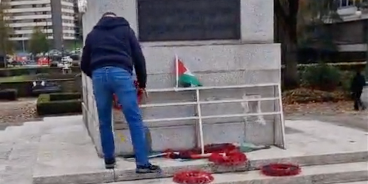 NextImg:Poppies stripped from Rochdale cenotaph as activists dress monument with Palestinian flags