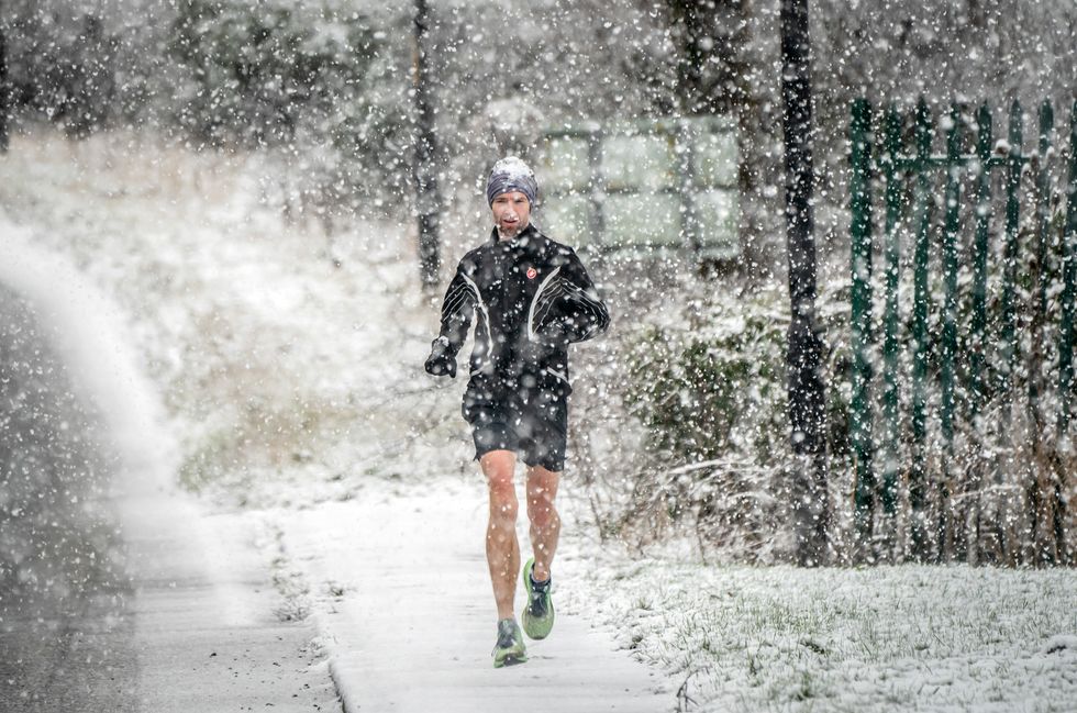 Man running through the snow