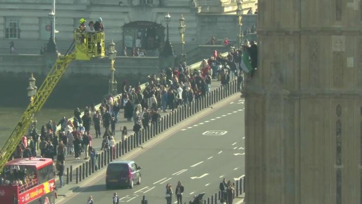 Pro-Palestine protester climbs up Big Ben as police shutdown Westminster Bridge