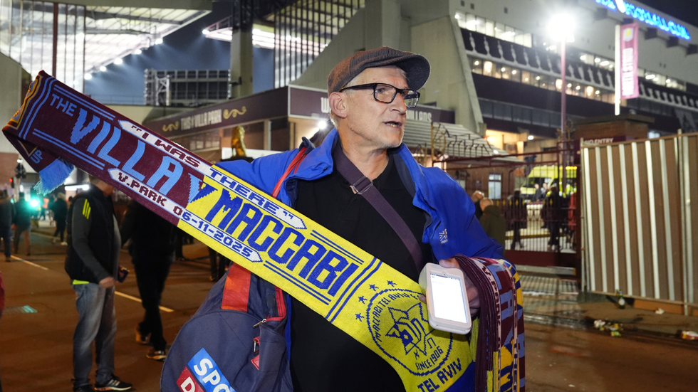 Man selling scarves outside Villa Park