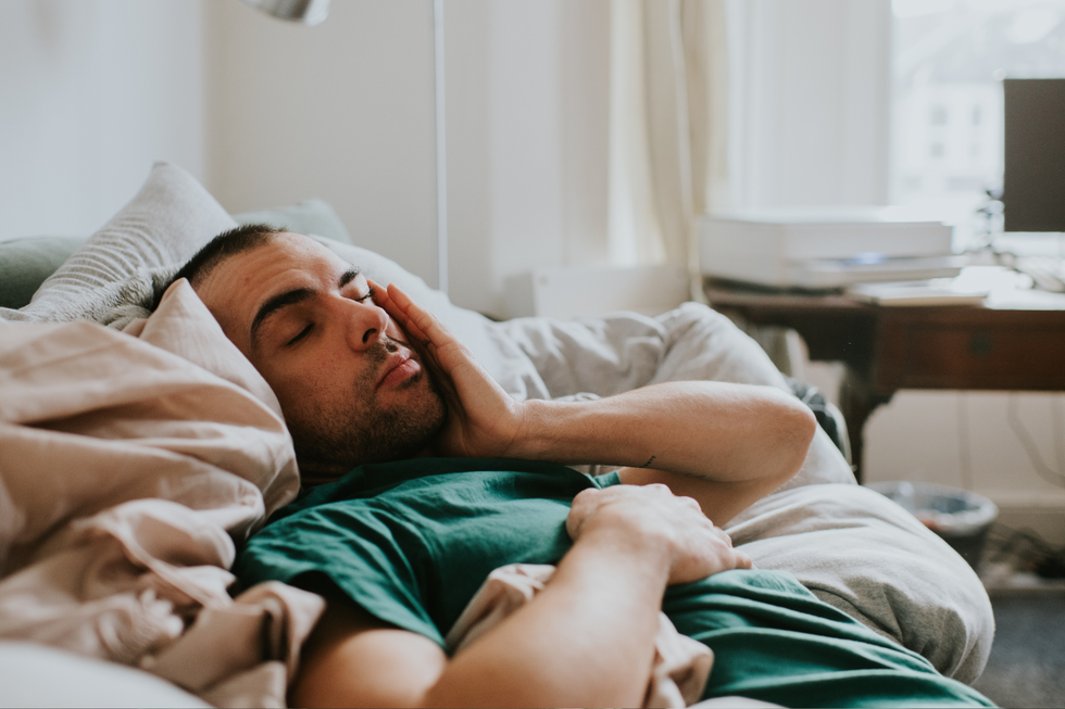 Man sleeping in bed