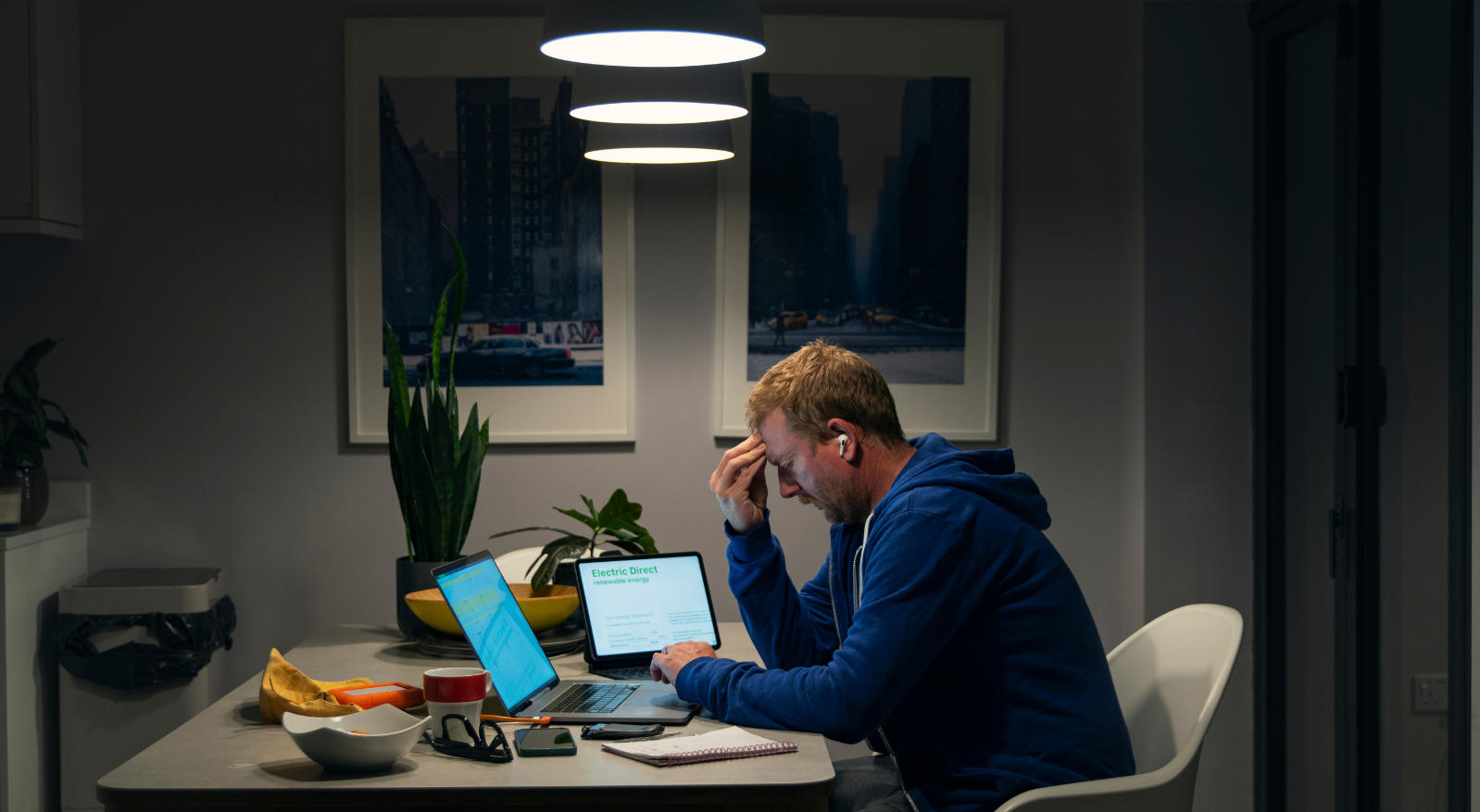 Man stressed looking at computer